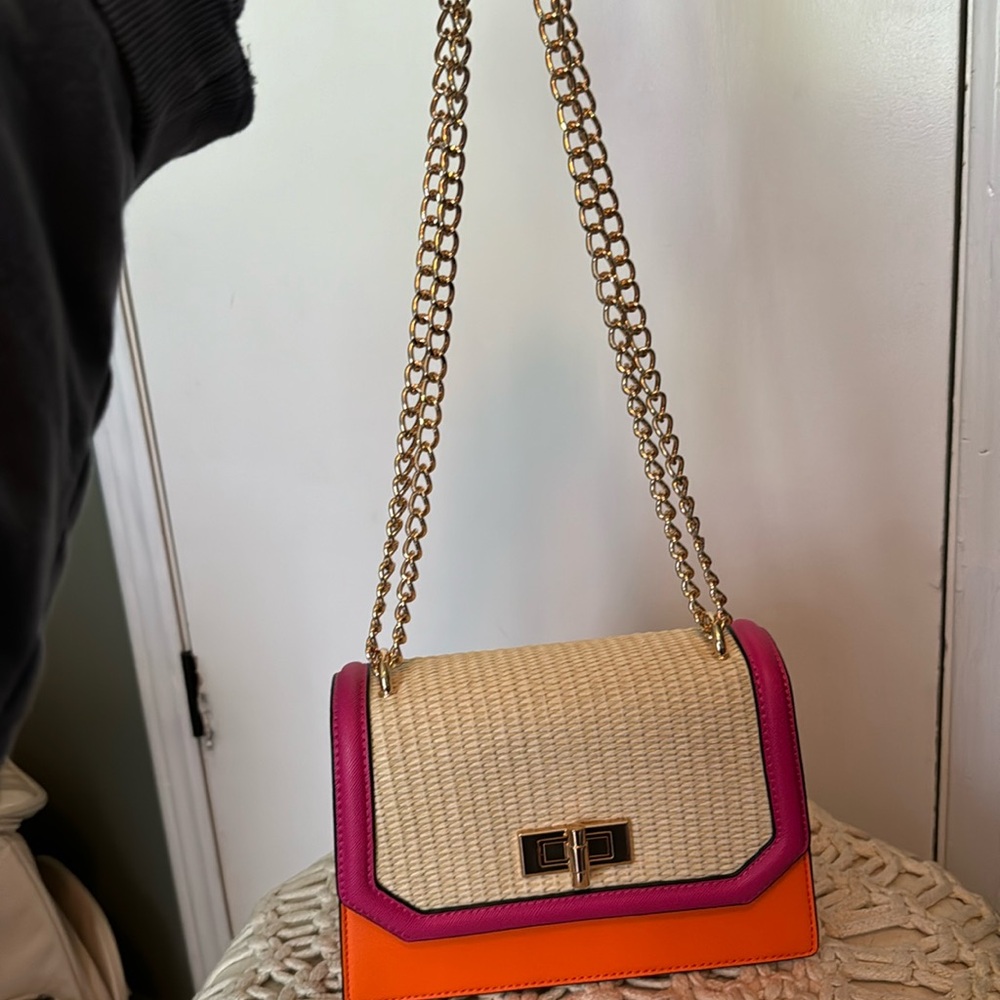 Pink, orange and raffia purse.